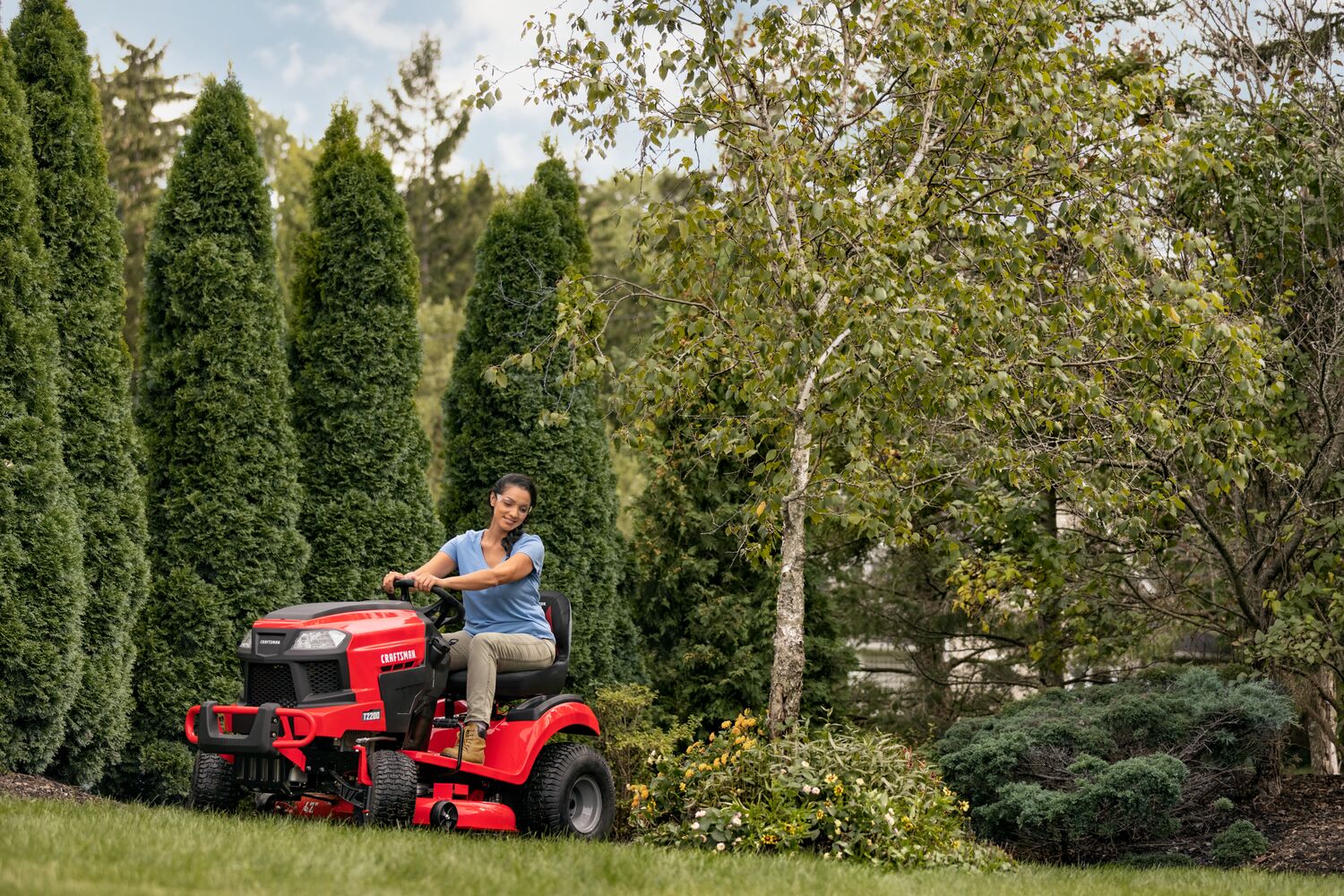 View of CRAFTSMAN Riding Mowers being used by consumer