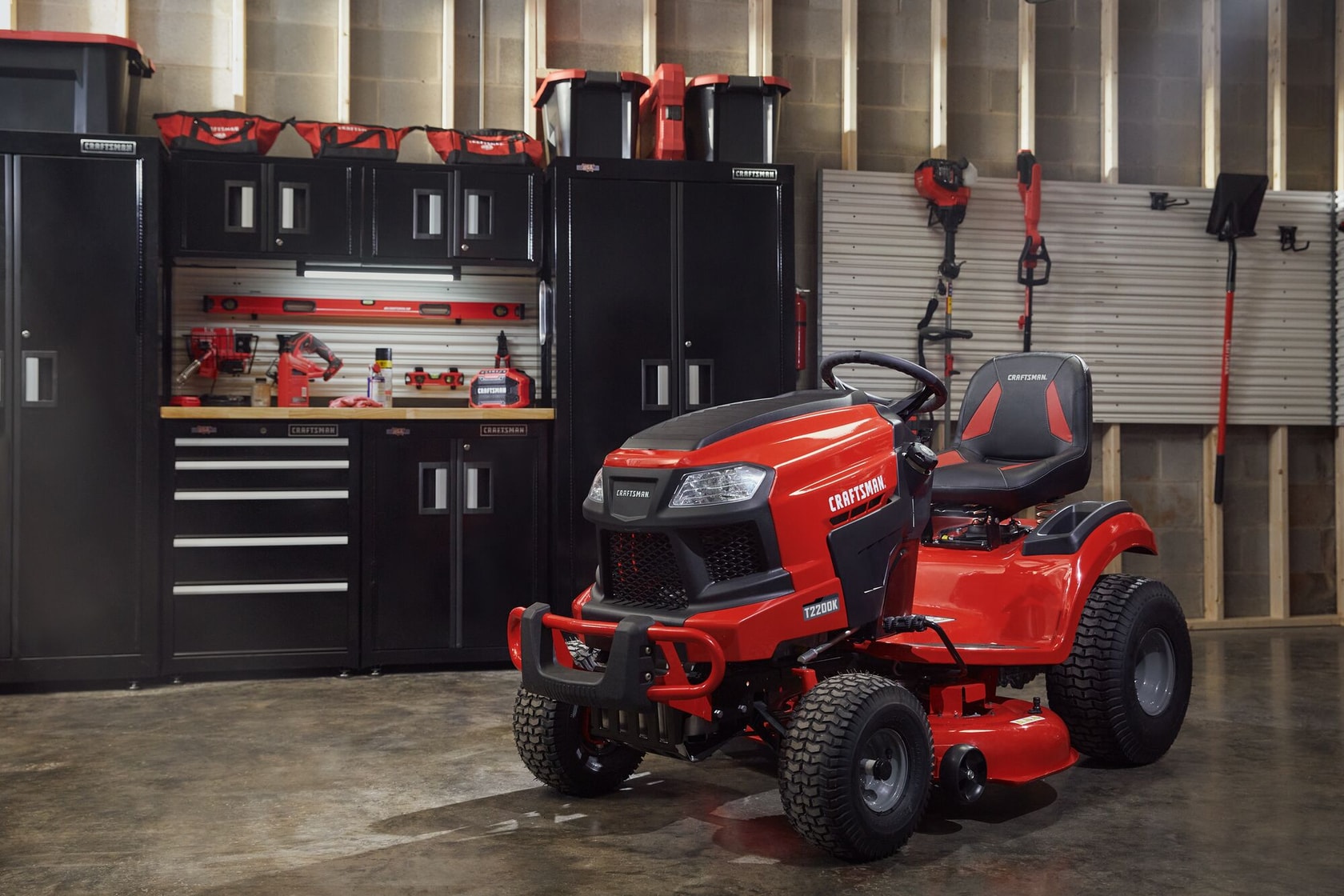 T2200K Gas Riding Mower in garage setting