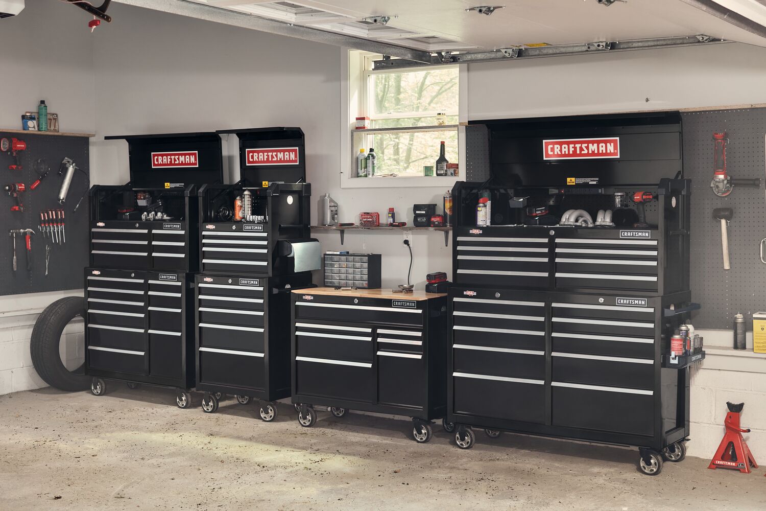 41 inch 6 drawer tool chest placed with other tool chests and rolling tool cabinet in workshop.