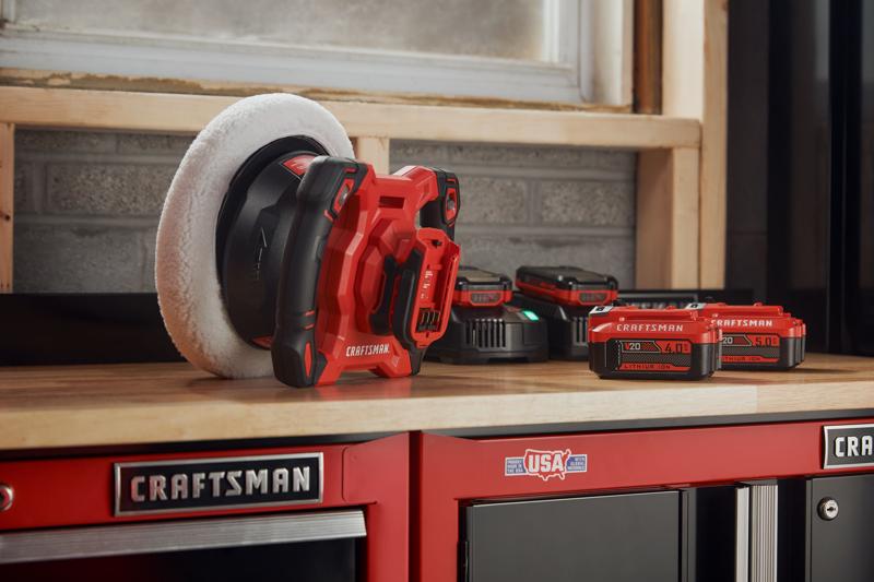 CRAFTSMAN V20* polisher sitting on top of CRAFSTMAN stroage with a variety of batteries