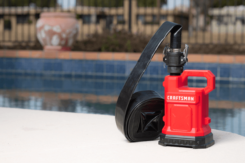 CMXWUSD61239 Thermoplastic Submersible Utility Pump front angle by pool.